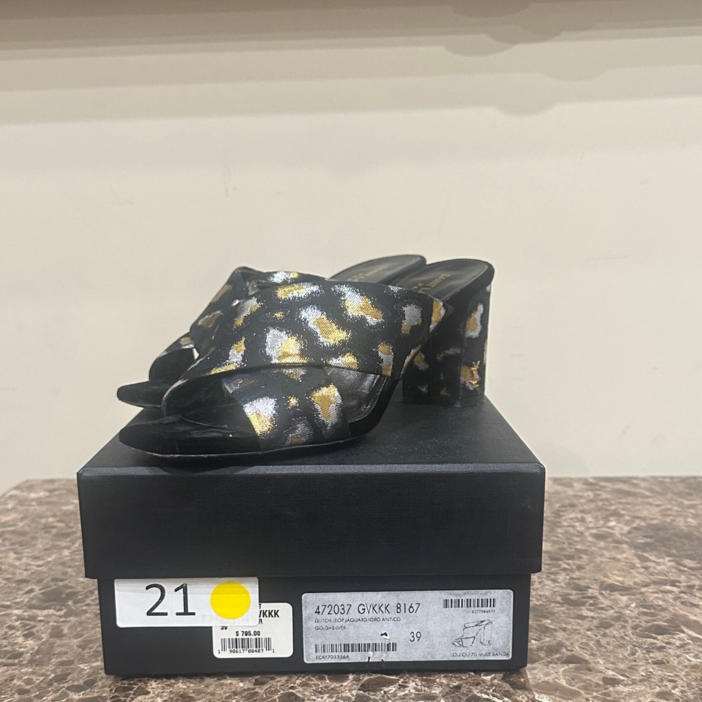 Yves Saint Laurent Black and Gold Mules
